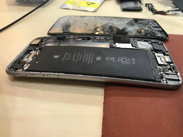iPhone component-level data recovery — disassembled iPhone logic board repair